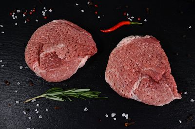 Антрекот из филейной части окорока свинины мраморных пород 